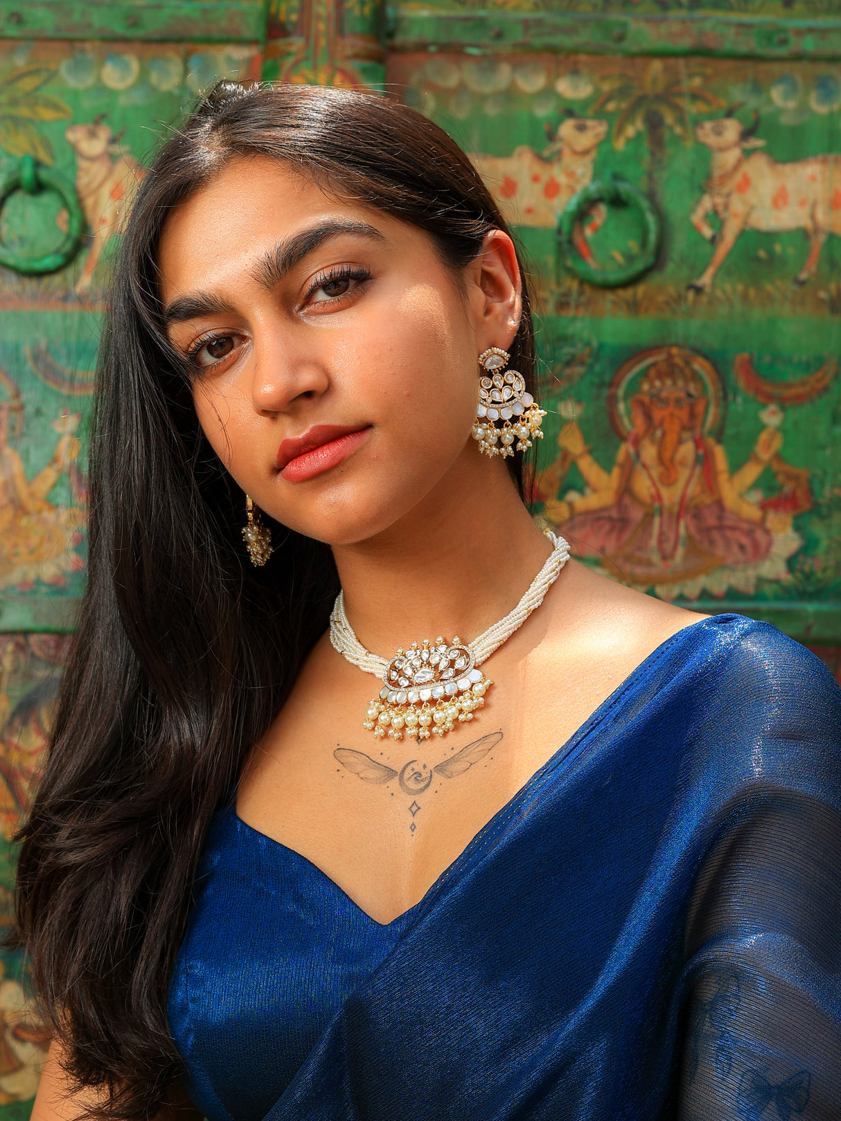 Roohani royal fusion tyaani kundan and mop choker set