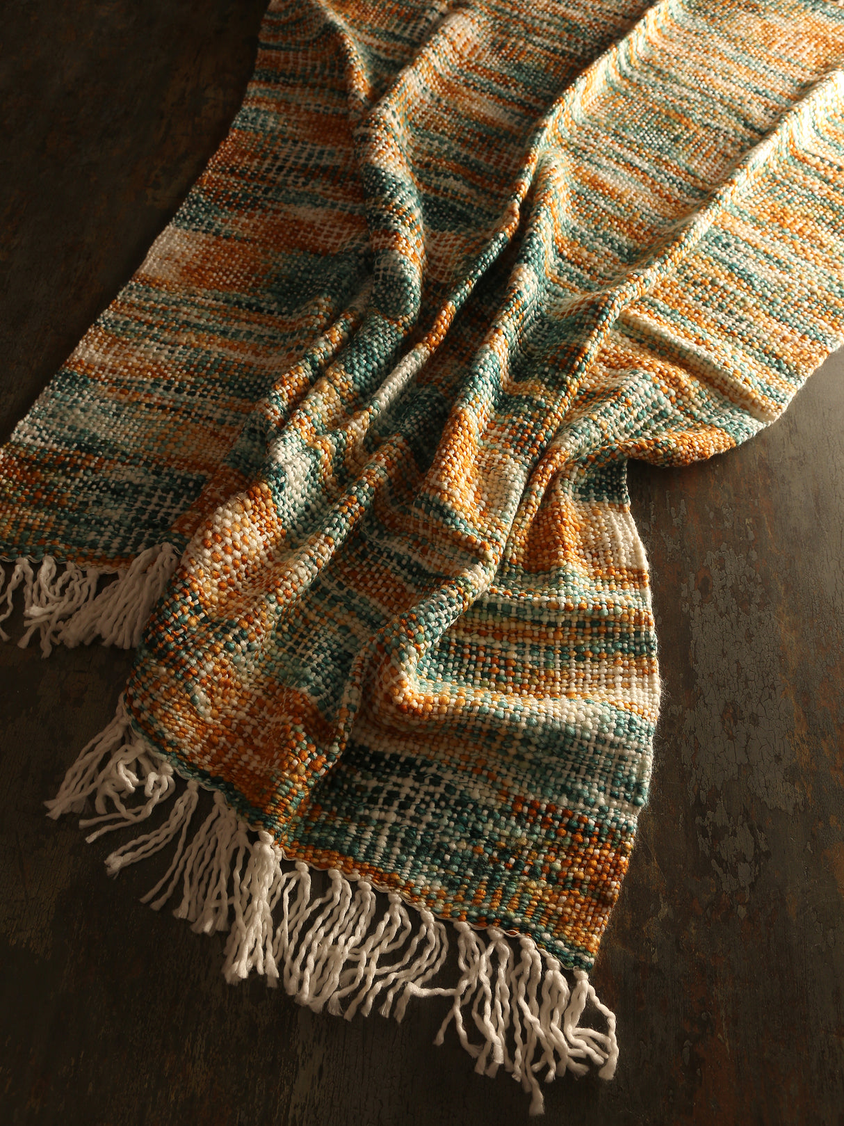 Soft Chunky Acrylic Wool throw in green, orange and multicolor weaving