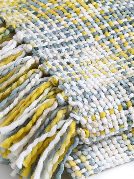 Soft Chunky Acrylic Wool throw in green, yellow and ivory weaving with multicolor or white tassels.