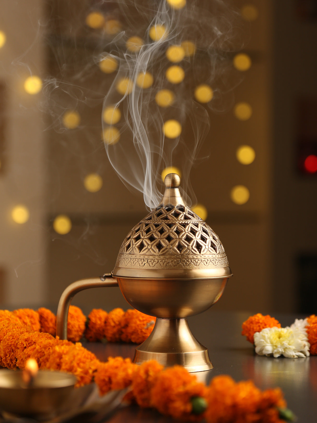 Dome shape brass incense burner with handle