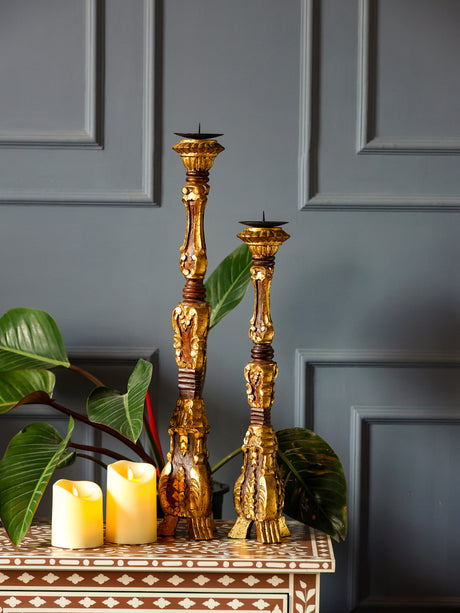 Antique Candle Holders - A Symphony of Radiant Gold Foil Designs
