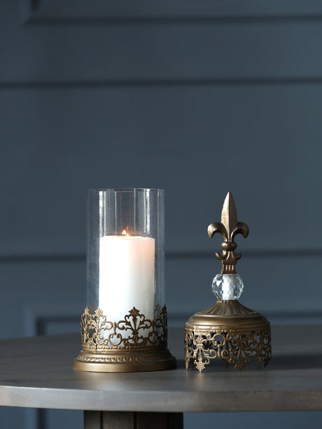 Decorative iron and glass candle holder in rustic gold finish for vintage home decor