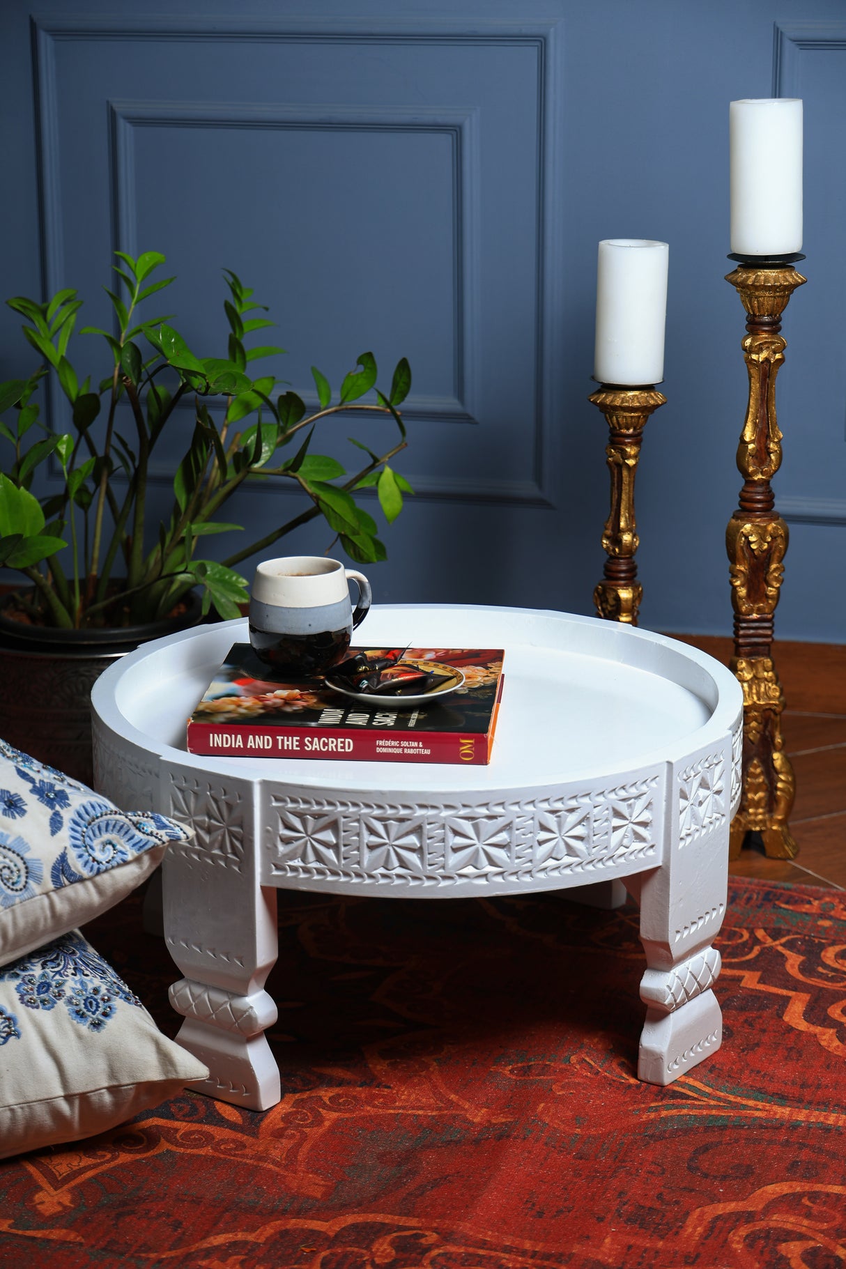 Wooden coffee table with white wash finish .