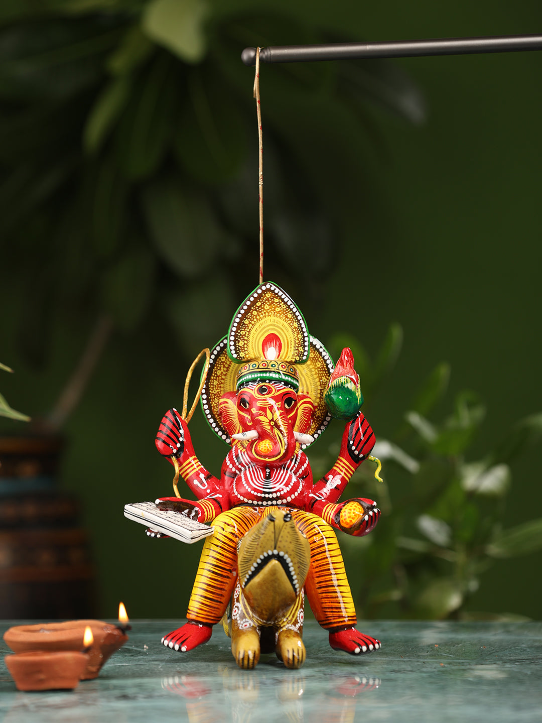 Hanging Ganesha on Mushak