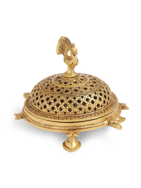 Elegant brass incense burner with intricate peacock detailing