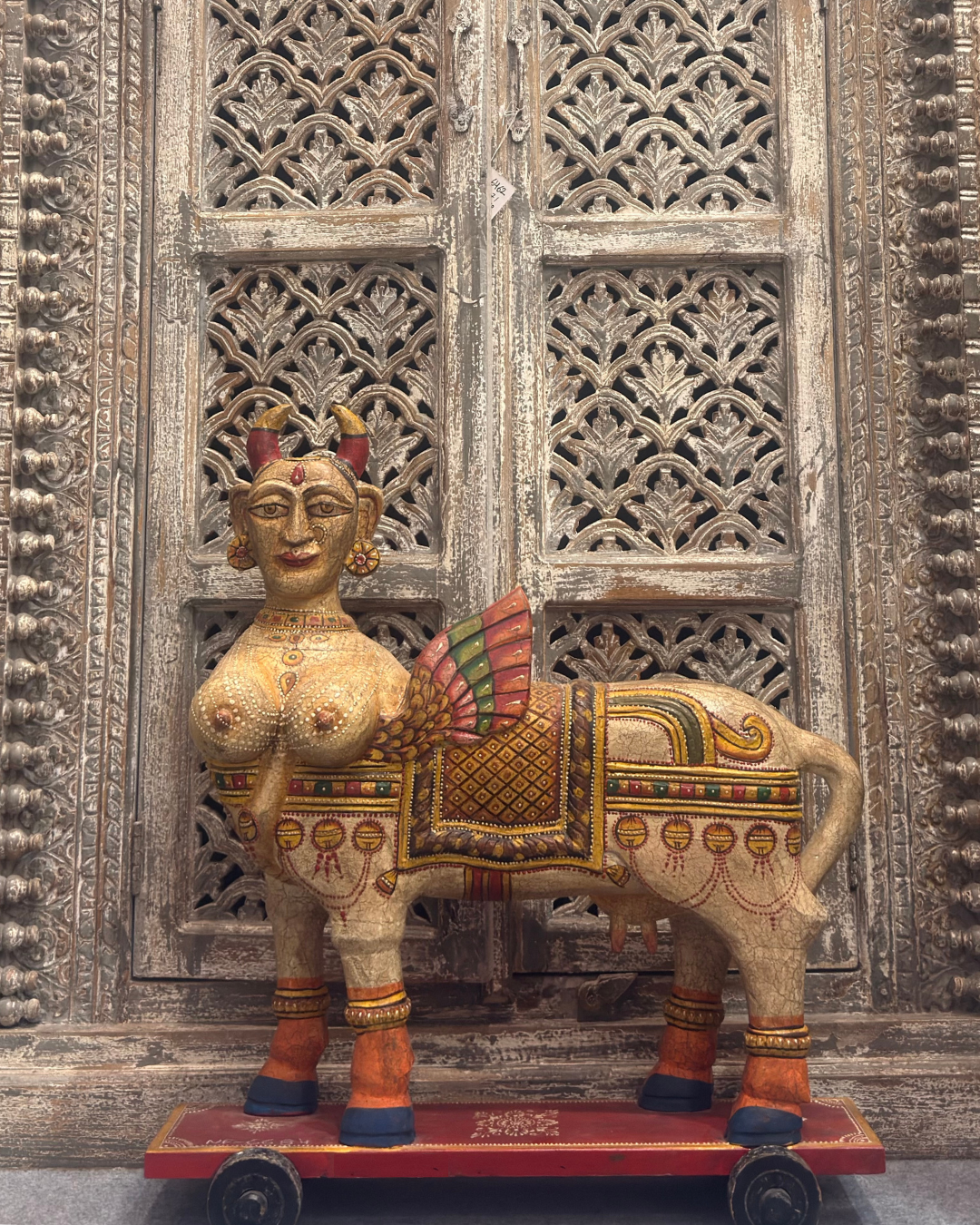 Kamdhenu wth wings on wheels