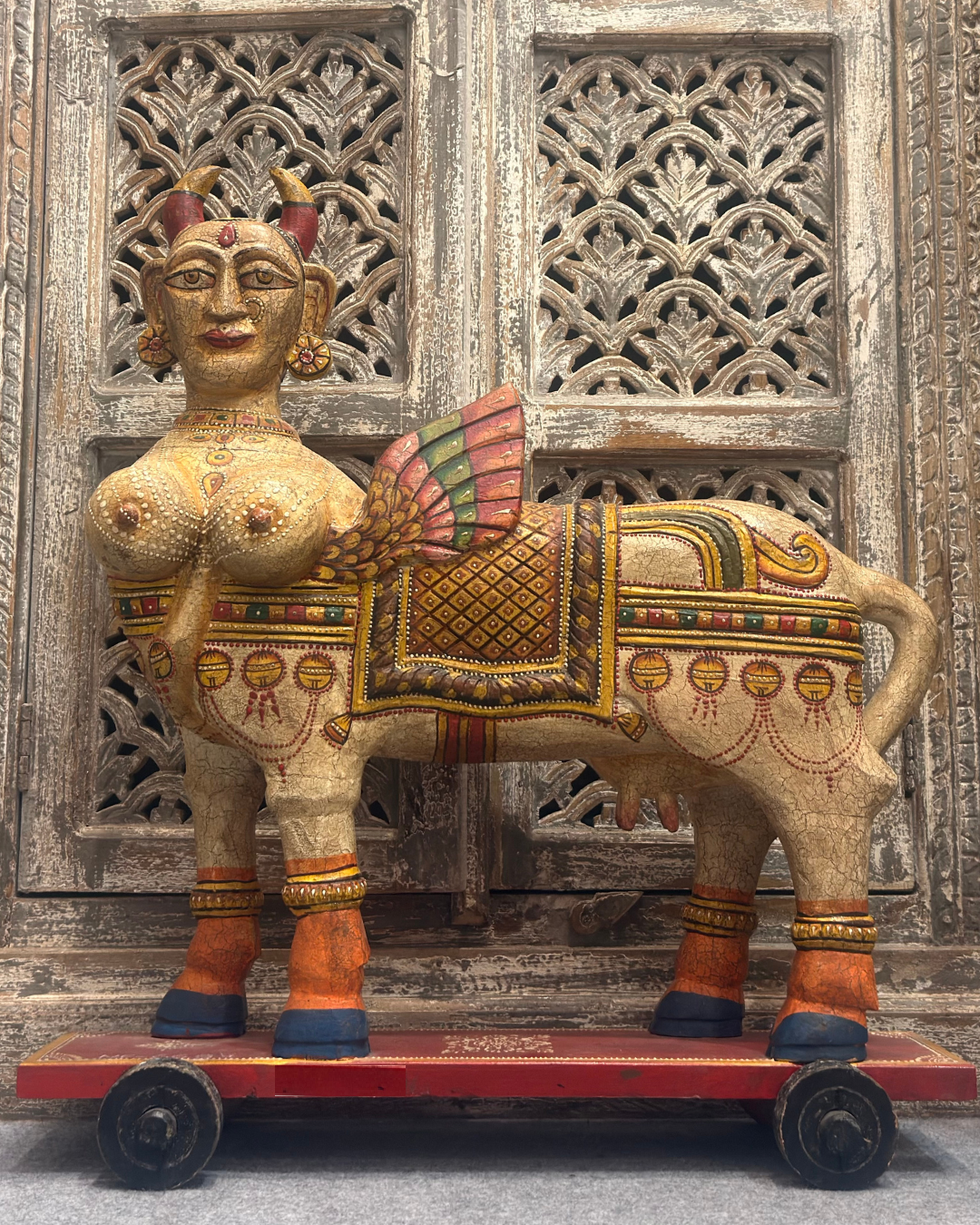 Kamdhenu wth wings on wheels