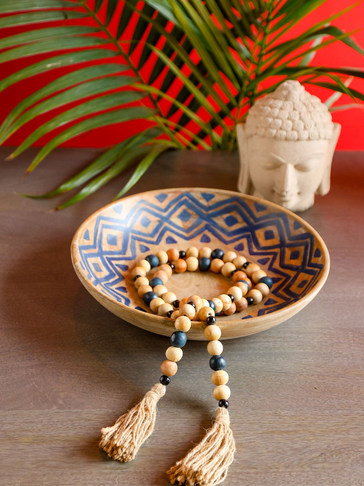 Handcrafted wooden beaded décor string with multicolor beads.