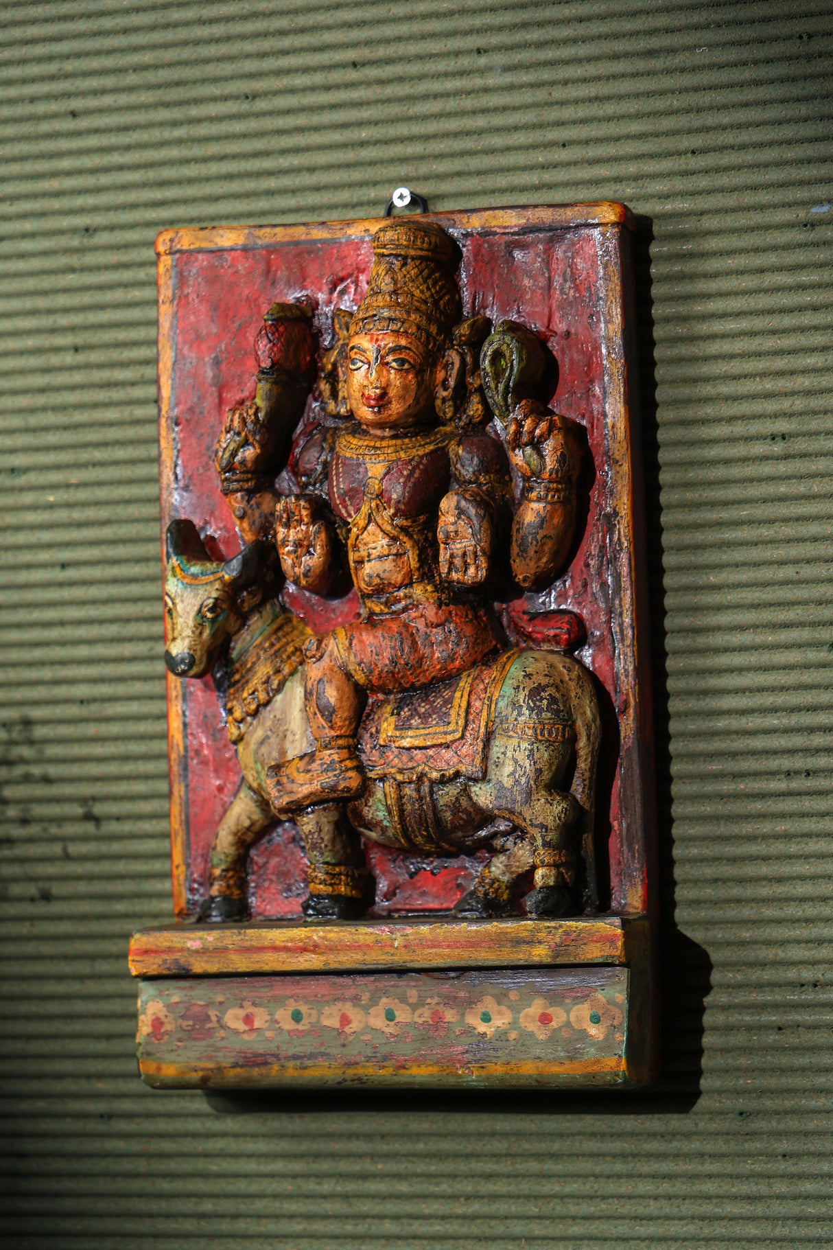 A Dev wooden panel hand painted