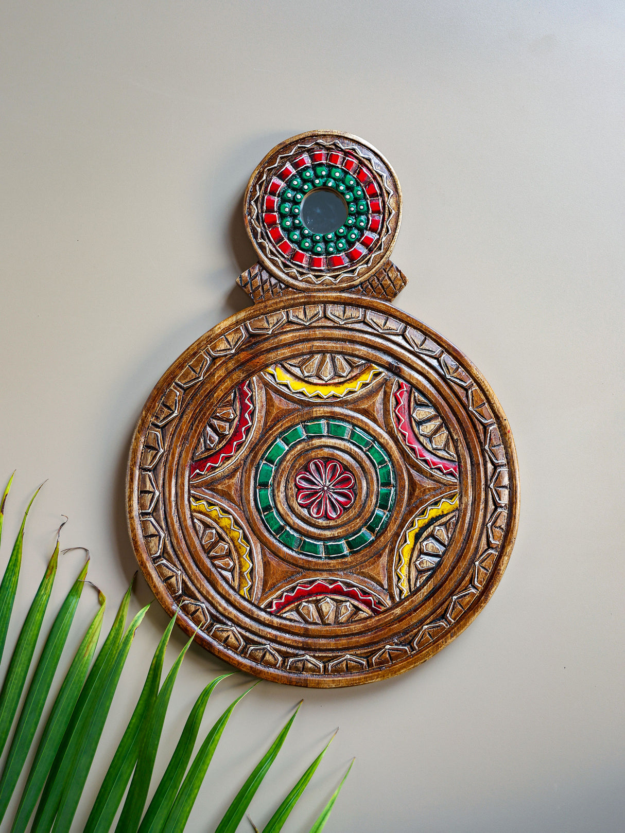 Earthy Elegance: The Allure of a Rustic Green and Red Carved Platter