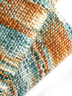 Soft Chunky Acrylic Wool throw in green, orange and multicolor weaving