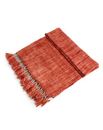 Soft Chunky Acrylic Wool throw in hues of rust and ivory weaving