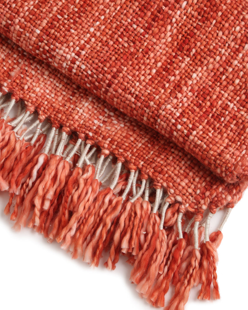 Soft Chunky Acrylic Wool throw in hues of rust and ivory weaving