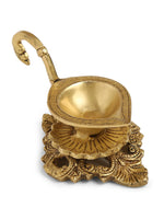 Diya - Brass Diya With Handle And Intricate Base