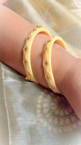 Ruhani  Brass leaf And Small Bell Bangles