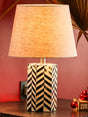 CelestialShine bone table lamp featuring a chic black and white pattern, perfect for enhancing any interior with sophistication.