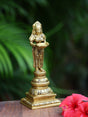 Handcrafted brass Deep Laxmi oil lamp, symbolizing prosperity and spirituality, with intricate detailing and a serene presence.