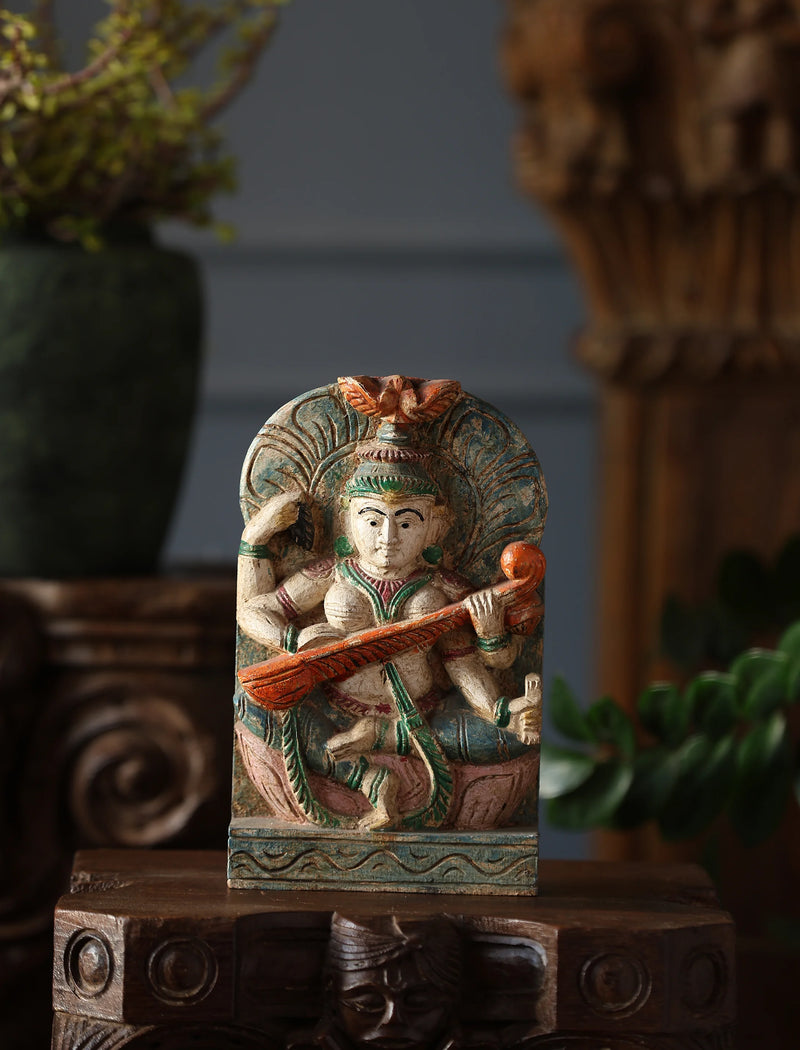 Wooden Whisper - Saraswati Carved Sculpture