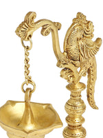 Brass peacock lamp with hanging Diya