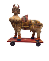 Kamdhenu wth wings on wheels