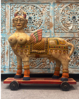 Kamdhenu wth wings on wheels