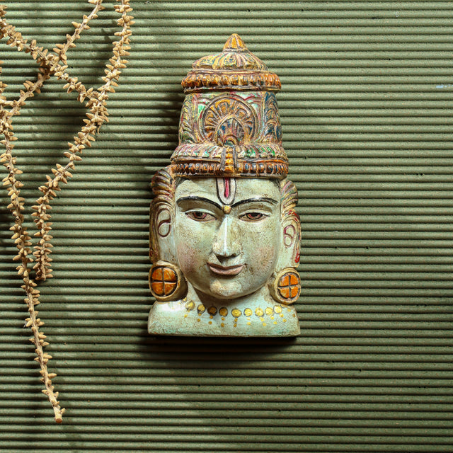 Hand-painted Vishnu mask in assorted colors, crafted from Vaaghai wood, showcasing Lord Vishnu’s serene and powerful expression.